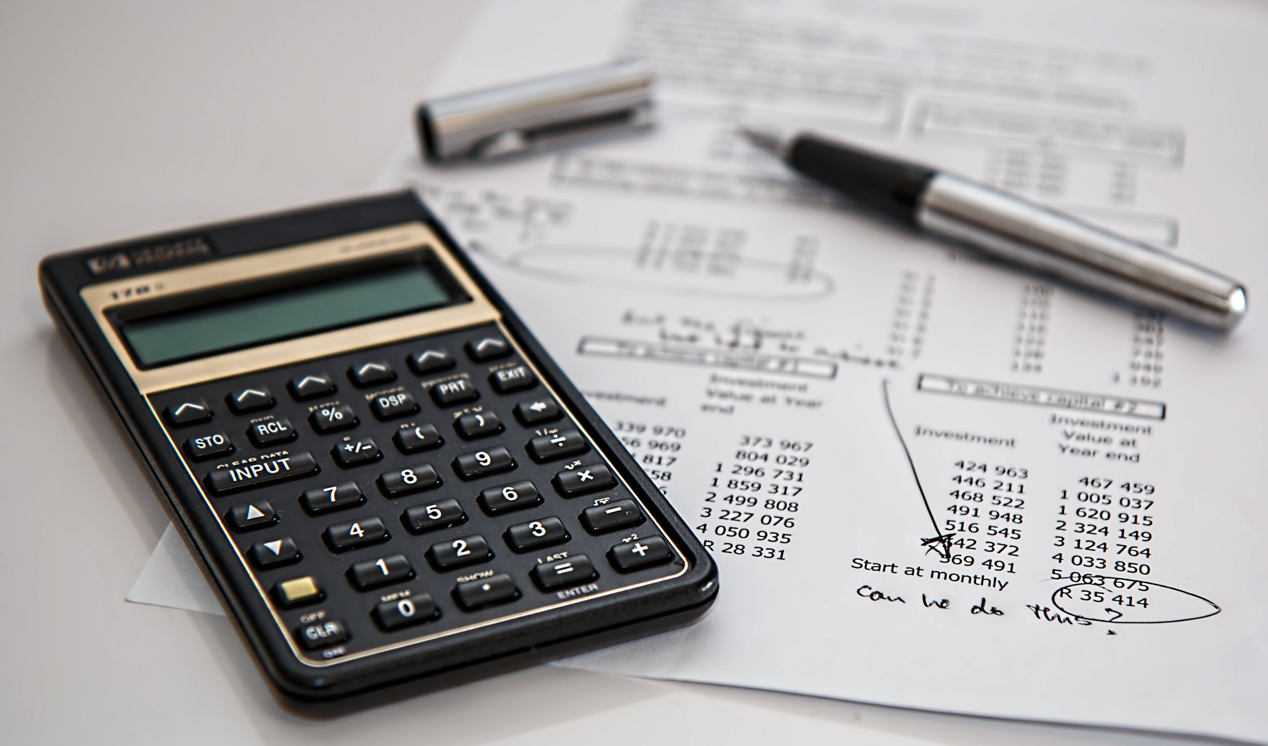 Photo of calculator and pen